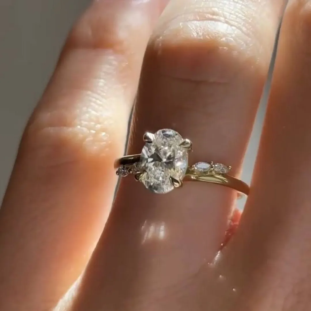 /public/photos/live/Unique Oval Cut Moissanite Bypass Engagement Ring 620 (2).webp